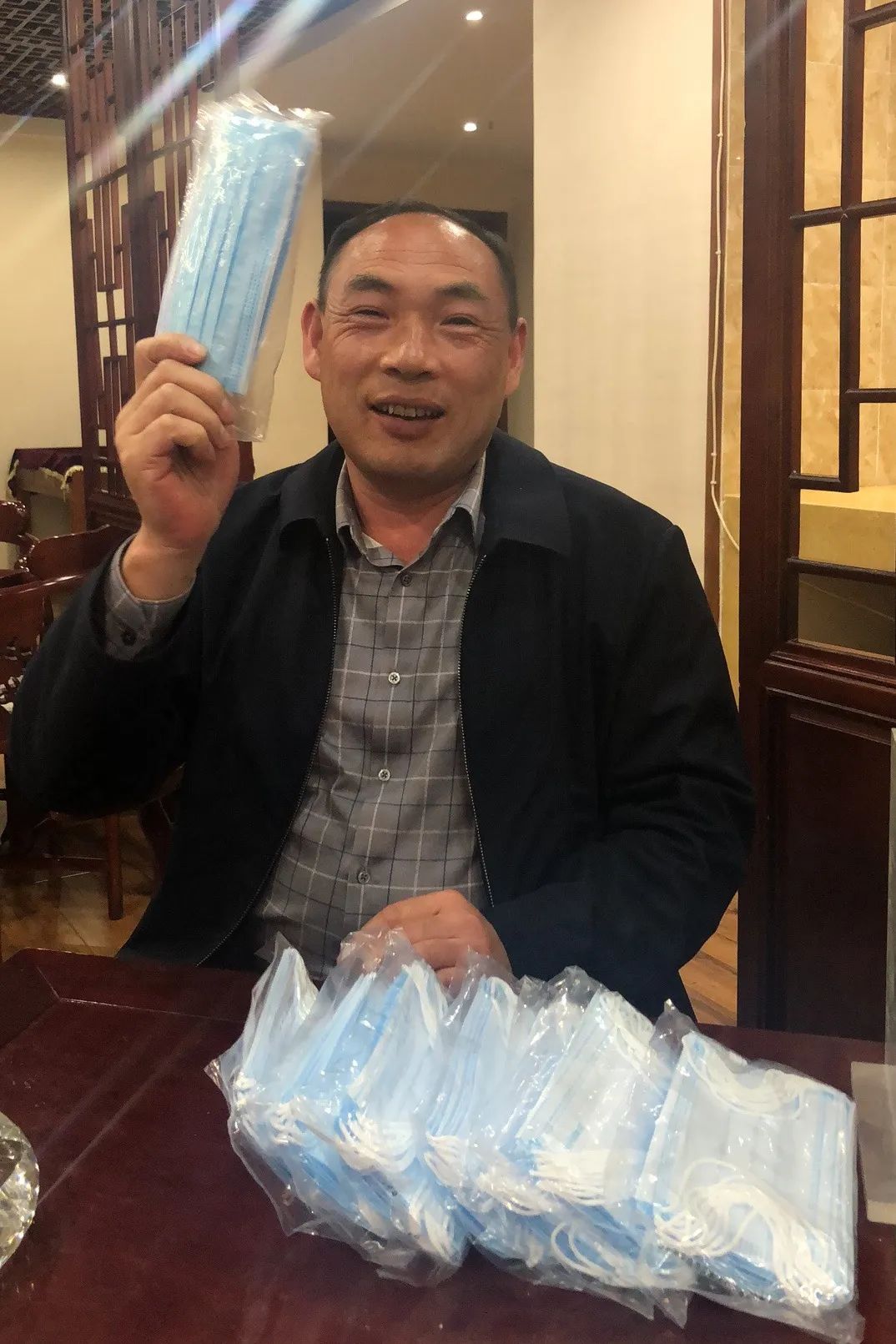 壹定发智能首批10万只自产口罩发放客户